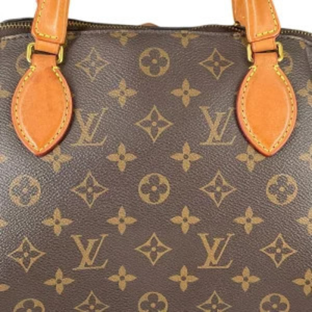 LOUIS VUITTON Monogram Rivoli - Picture 4 of 8